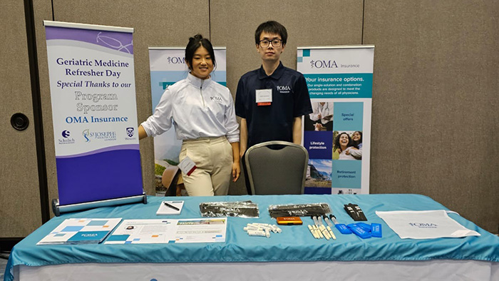 Karra Park and Ricky Zhang at an OMA Insurance event
