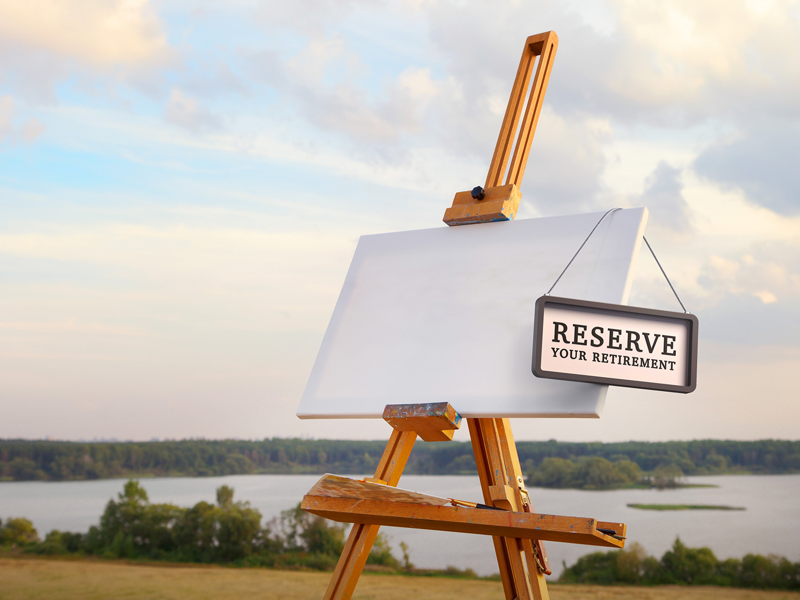 A blank canvas on an easel with a Reserve Your Retirement sign